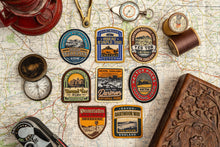 Load image into Gallery viewer, Adventure Patch Company Dartmoor patches styled – woven hiking patches collection shot