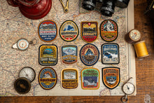 Load image into Gallery viewer, Adventure Patch Company Alps patches styled on outdoor gear – woven hiking patches Alpine range