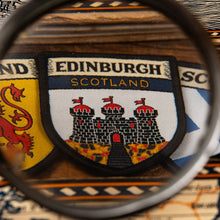 Load image into Gallery viewer, City of Edinburgh flag patch lifestyle shot on outdoor gear - retro woven Scottish city flag patch