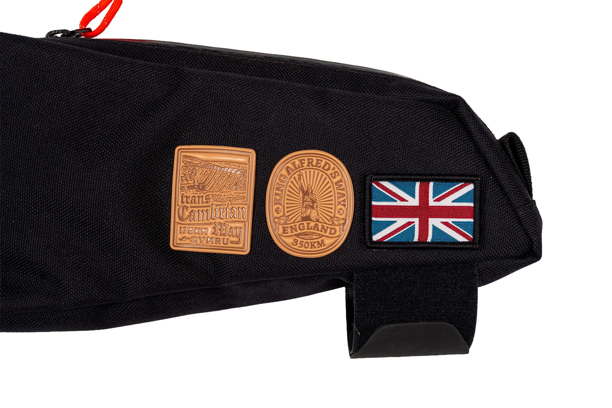 King Alfred's Way bikepacking patch lifestyle shot on cycling gear - retro woven cycling patch