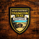 Tissington Trail retro woven patch – Peak District trail along former Ashbourne-Buxton railway, pub sign design