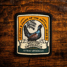 Western Capercaillie retro woven patch - iconic Scottish woodland bird, iron-on backing, recycled yarn