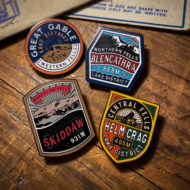 Lake District Fells enamel pins collection – four pins including Blencathra and Great Gable on display