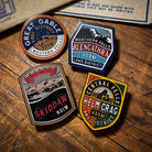 Lake District Fells enamel pins collection – four pins including Blencathra and Great Gable on display
