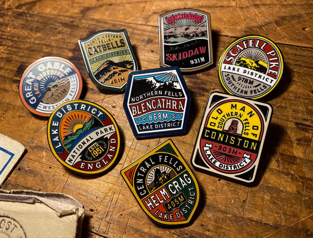 Set of 9 Lake District Fells enamel pins – Skiddaw pin included in collection