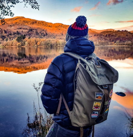 Wainwright completer patch on a rucksack with Lake District patches – retro woven completer patch