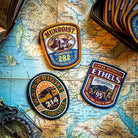 Completer patches set including Wainwright completer – retro woven commemorative hiking patches