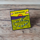 Dartmoor National Park enamel pin – Down Tor stone circle design, 23mm x 23mm, letterpress backing