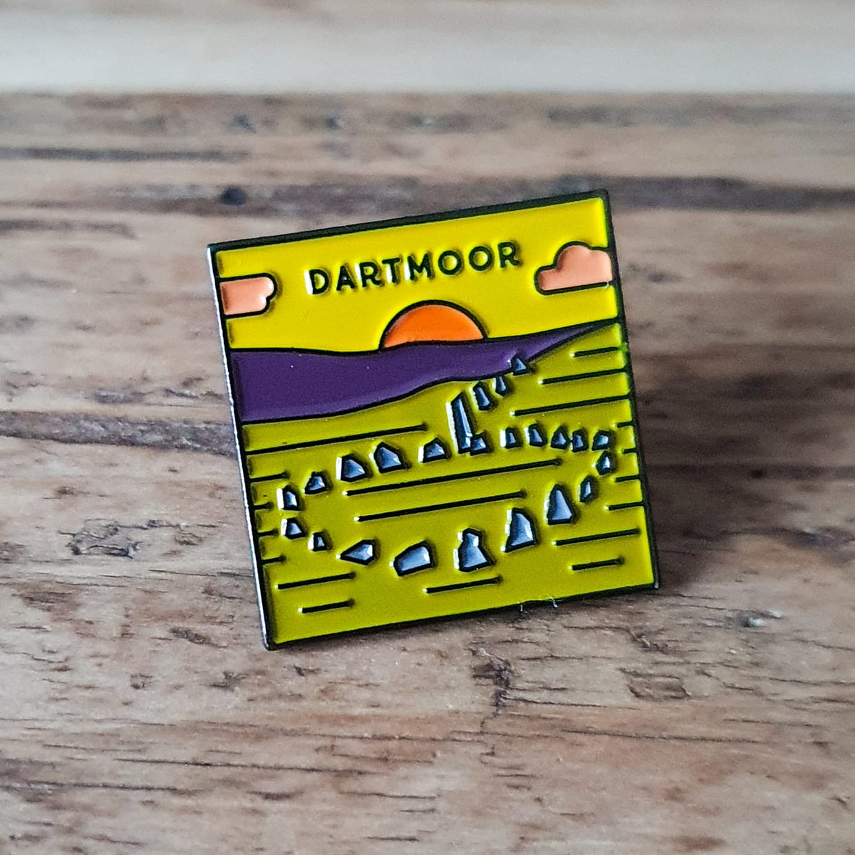 Dartmoor National Park enamel pin – Down Tor stone circle design, 23mm x 23mm, letterpress backing