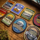 Dartmoor patches angled display – Haytor Rocks patch included in retro woven patch collection