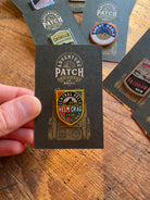 Helm Crag enamel pin displayed on backing card – Lake District Fells hard enamel pin
