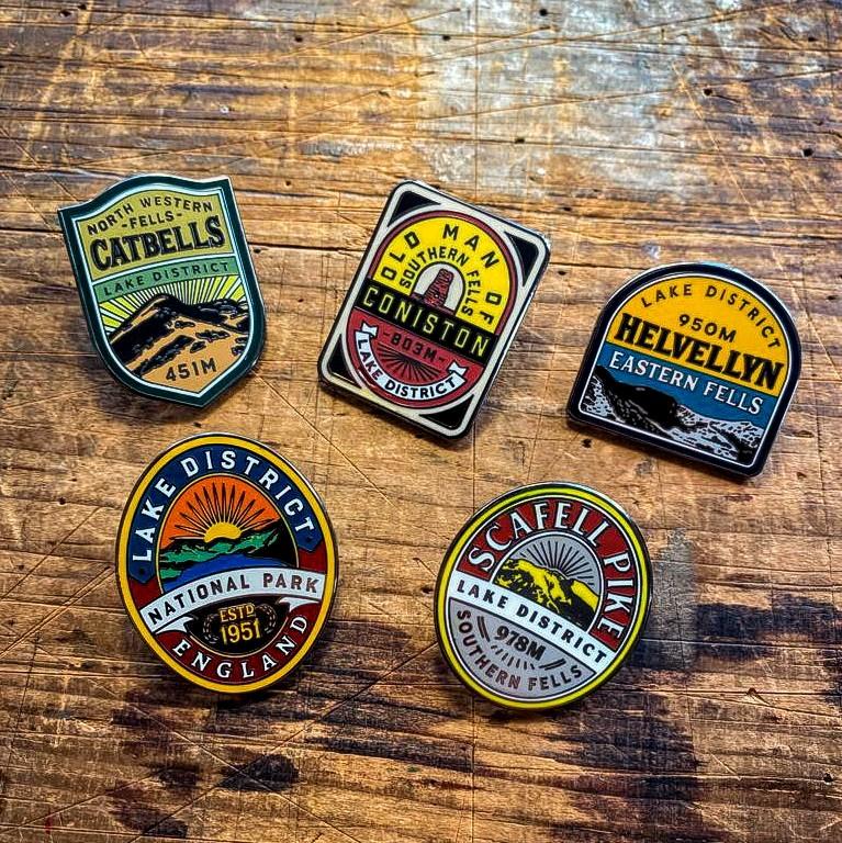 Lake District Fells enamel pins on backing cards – Helvellyn pin displayed in collection