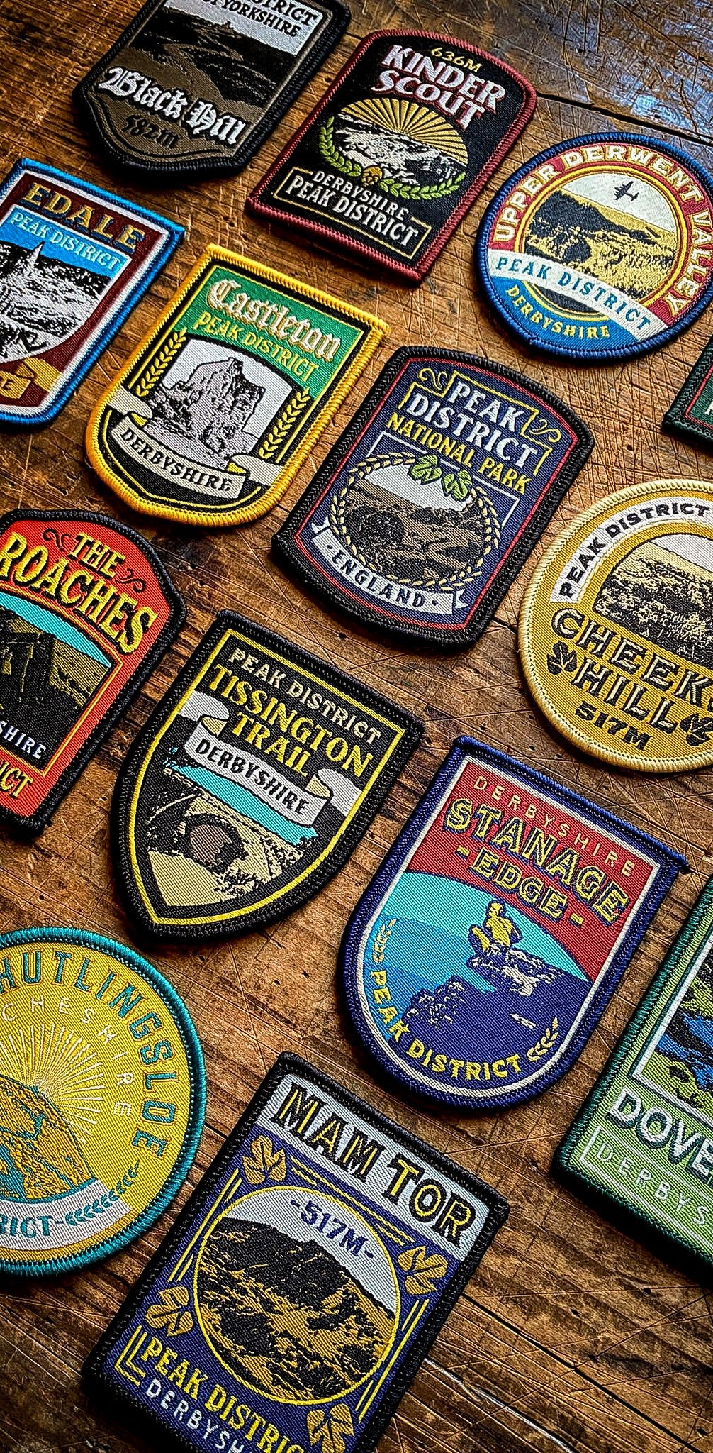 Peak District patches display including Cheeks Hill – pub sign retro woven patch collection