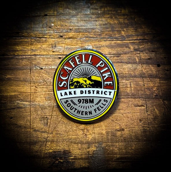 Scafell Pike enamel pin in hand – Lake District Fells pins set of five shown up close