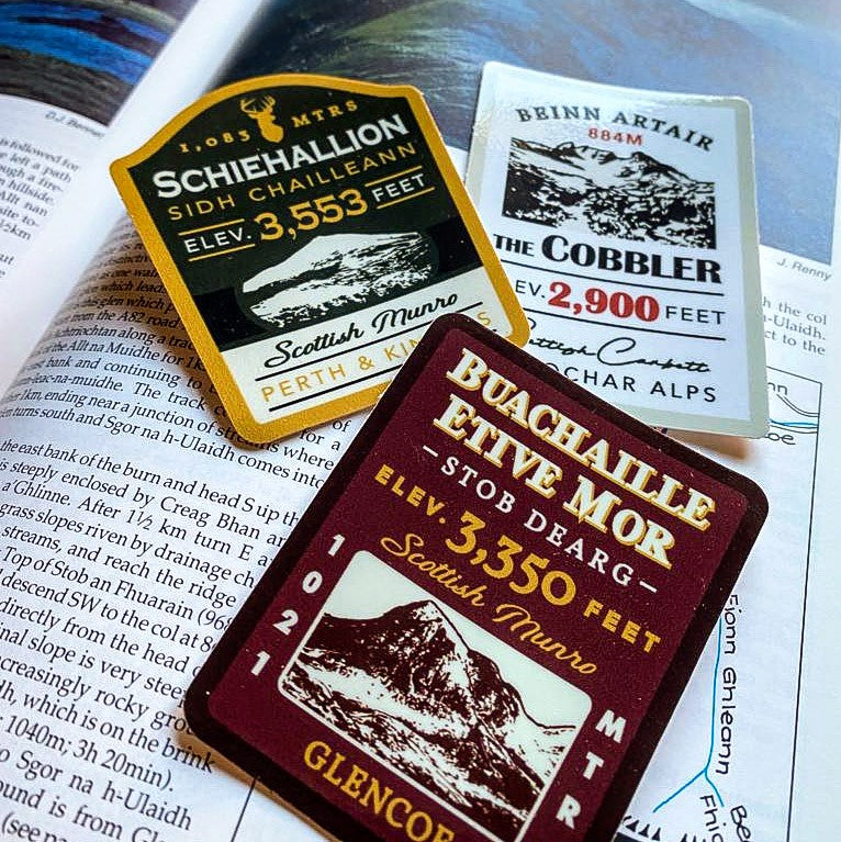 Scottish mountain vinyl stickers collection on a surface – Ben Nevis sticker included, outdoor sticker range