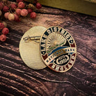 Lake District Heritage pin badge close-up – hard enamel badge for Lake District and outdoor enthusiasts